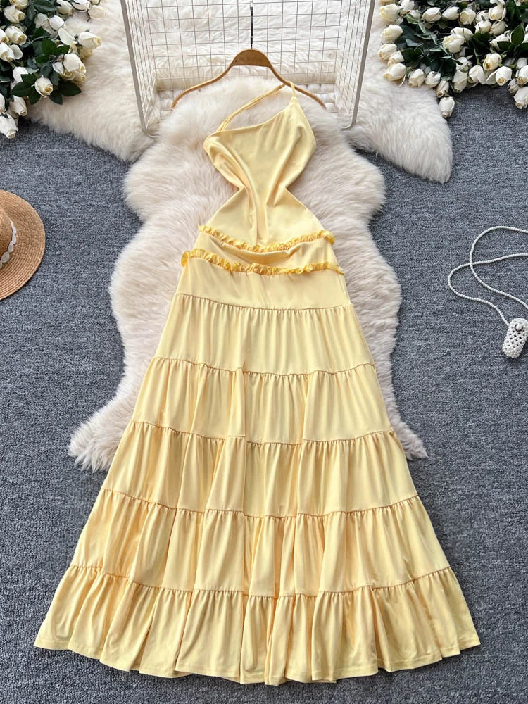 yellow halter ruffle dress Low Back Halter Ruffle Dress | MAHAHUAL RUFFLE
